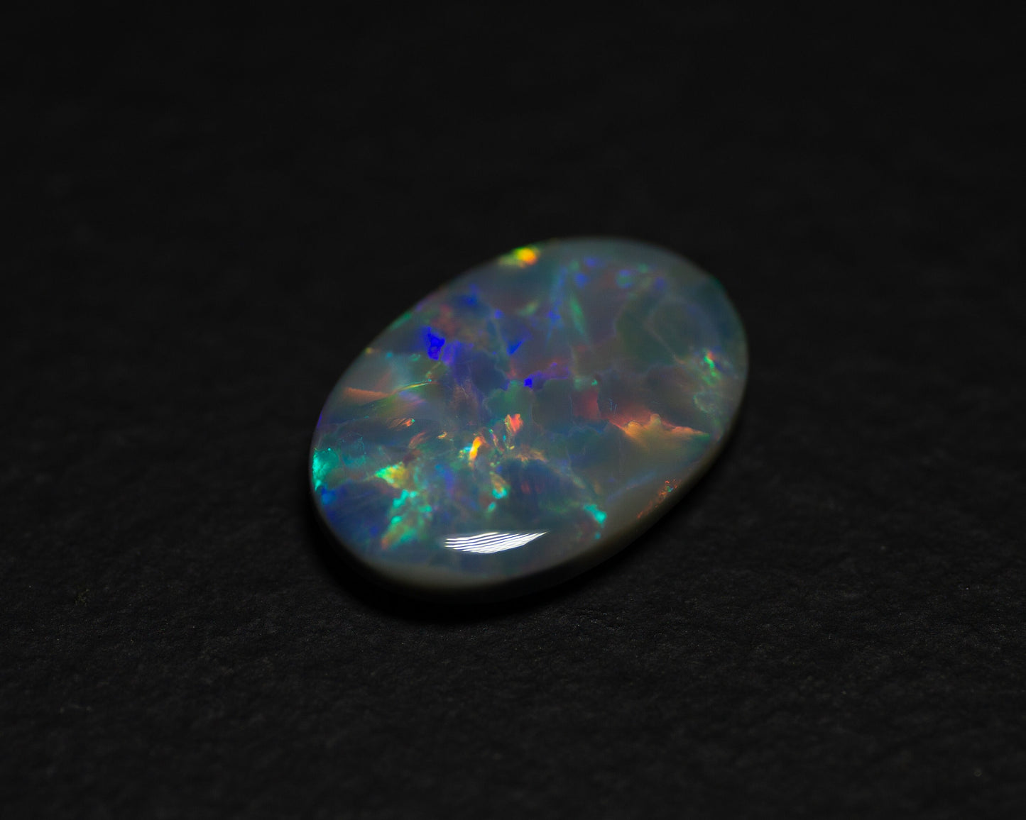 3.28 Carat Dark Opal Oval Cabochon Lightning Ridge Australia - Redpoint Jewelry 