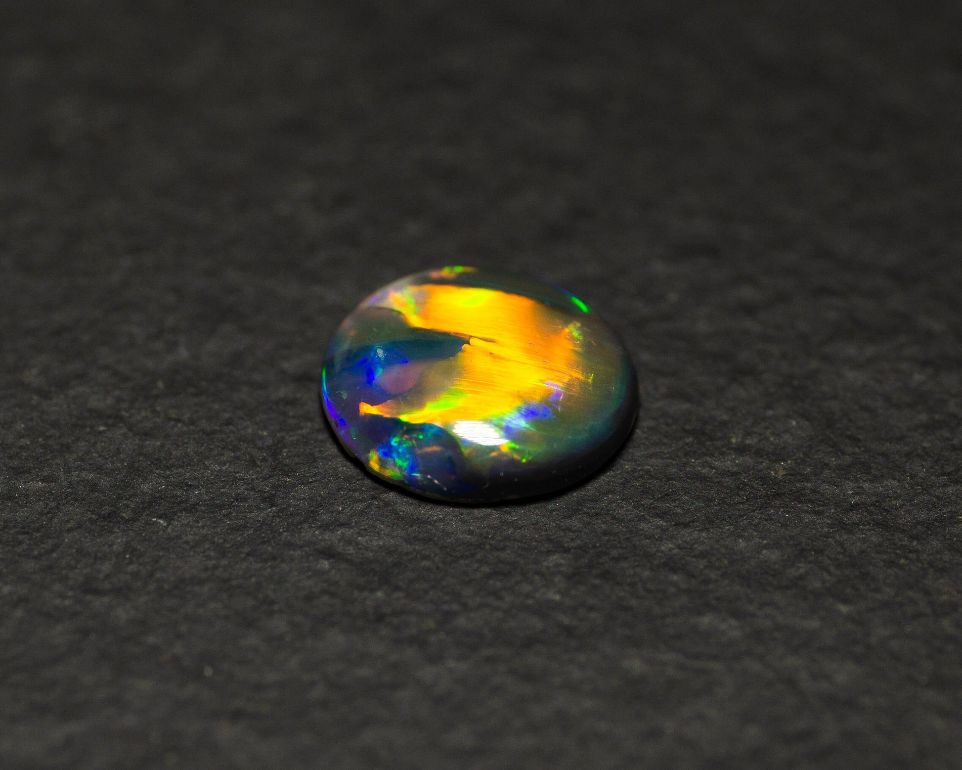 0.77 Carat Black Opal Oval Cabochon From Lightning Ridge Australia - Redpoint Jewelry 