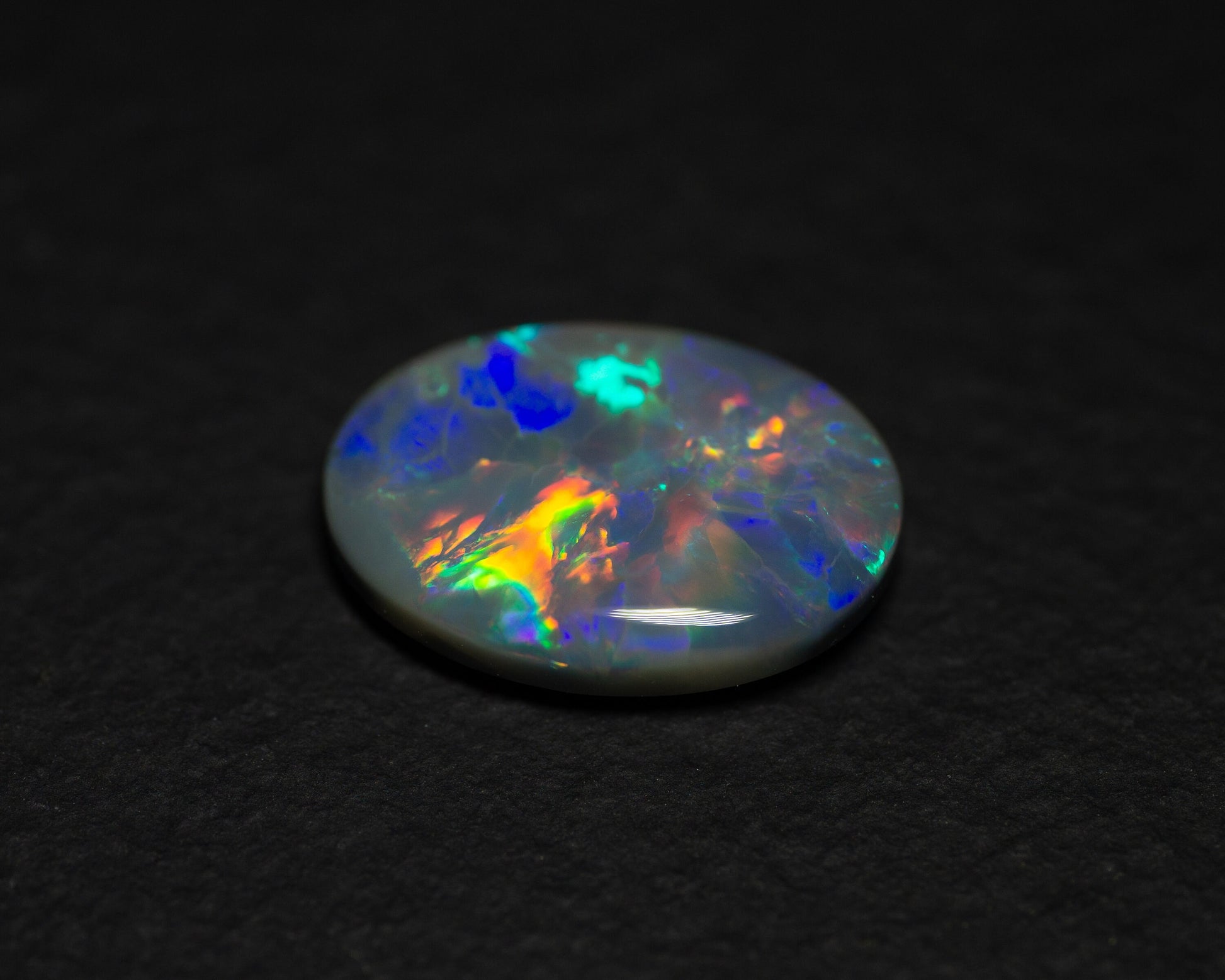 3.28 Carat Dark Opal Oval Cabochon Lightning Ridge Australia - Redpoint Jewelry 