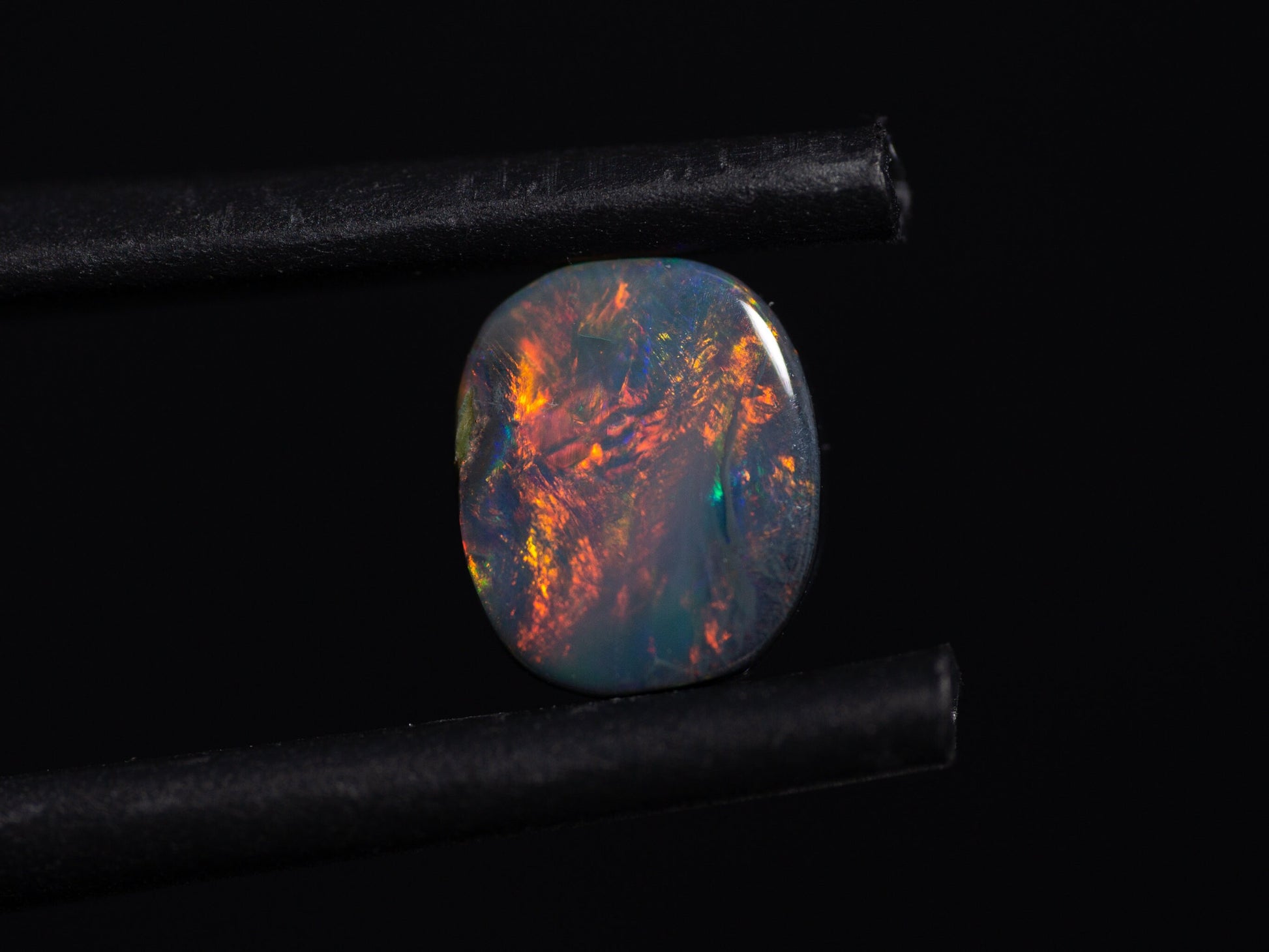 0.56 Carat Black Opal Cushion Cut Cabochon Lightning Ridge Australia - Redpoint Jewelry 