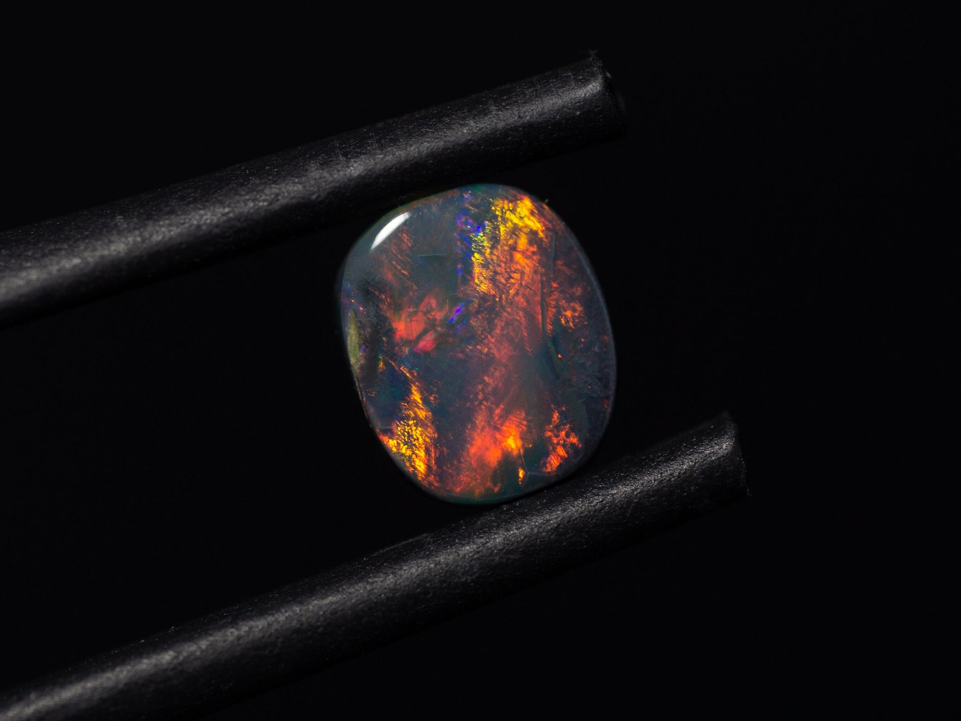 0.56 Carat Black Opal Cushion Cut Cabochon Lightning Ridge Australia - Redpoint Jewelry 